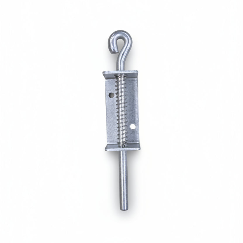Metal spring-loaded hook on a beige surface